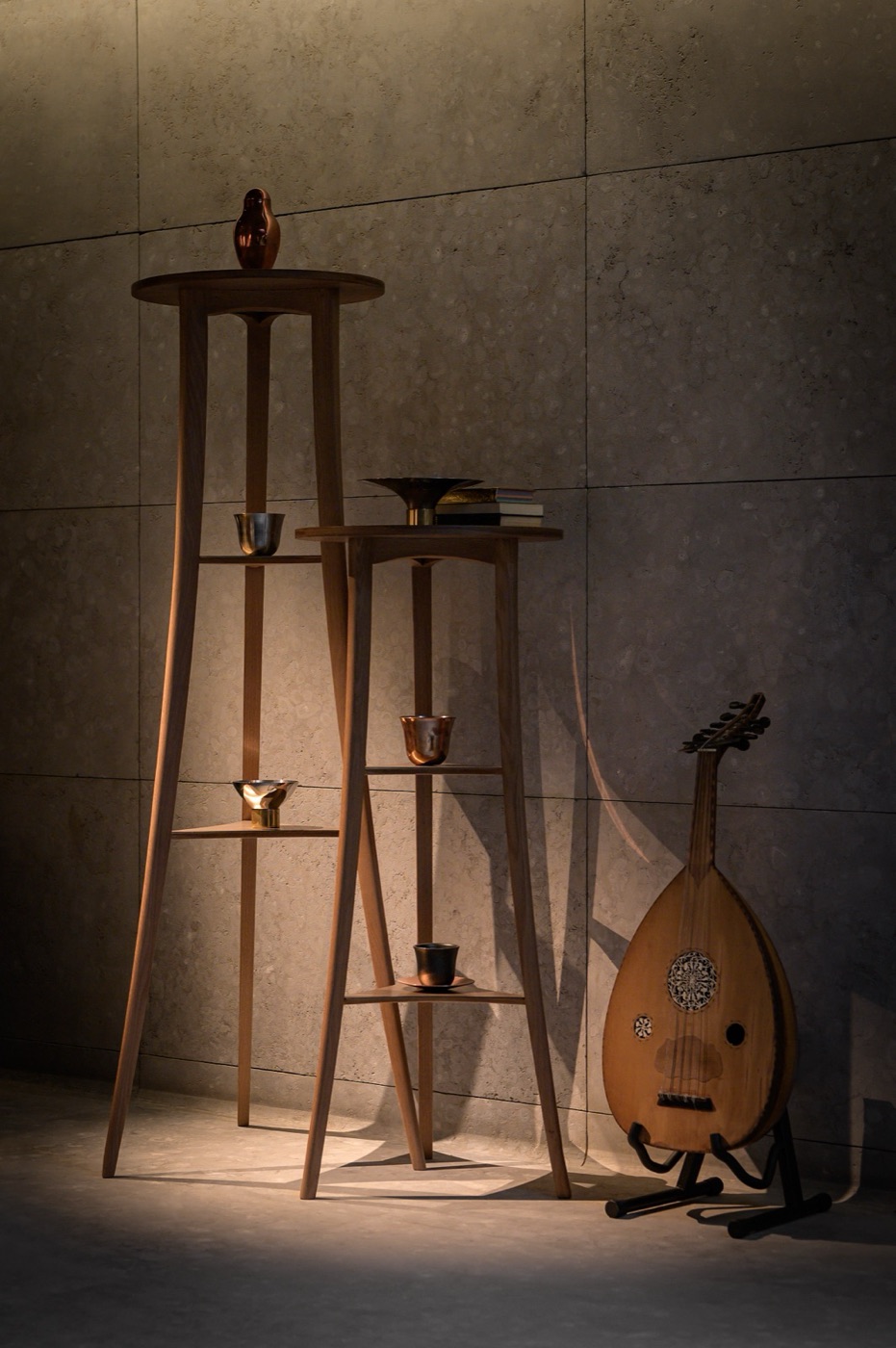 Turned wooden stands holding small vessels, an oud resting alongside